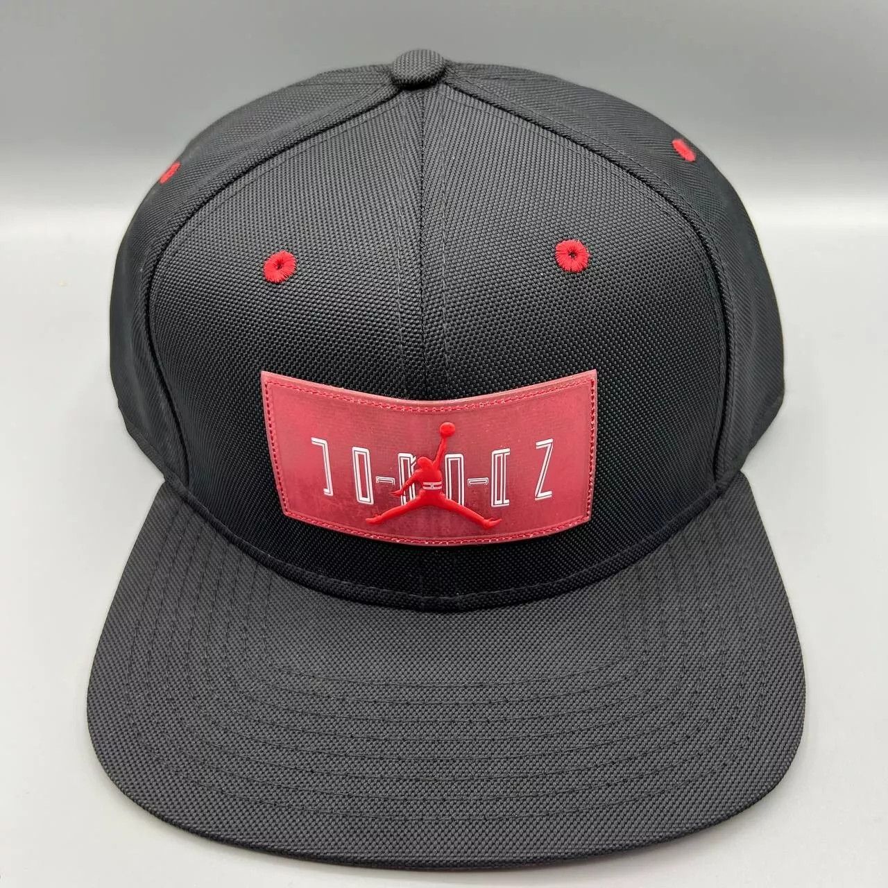 Jordan Brand Air Jordan 11 Hat Men Black Red Jumpman Bred Snap Back Cap Size ONE SIZE - 1 Thumbnail