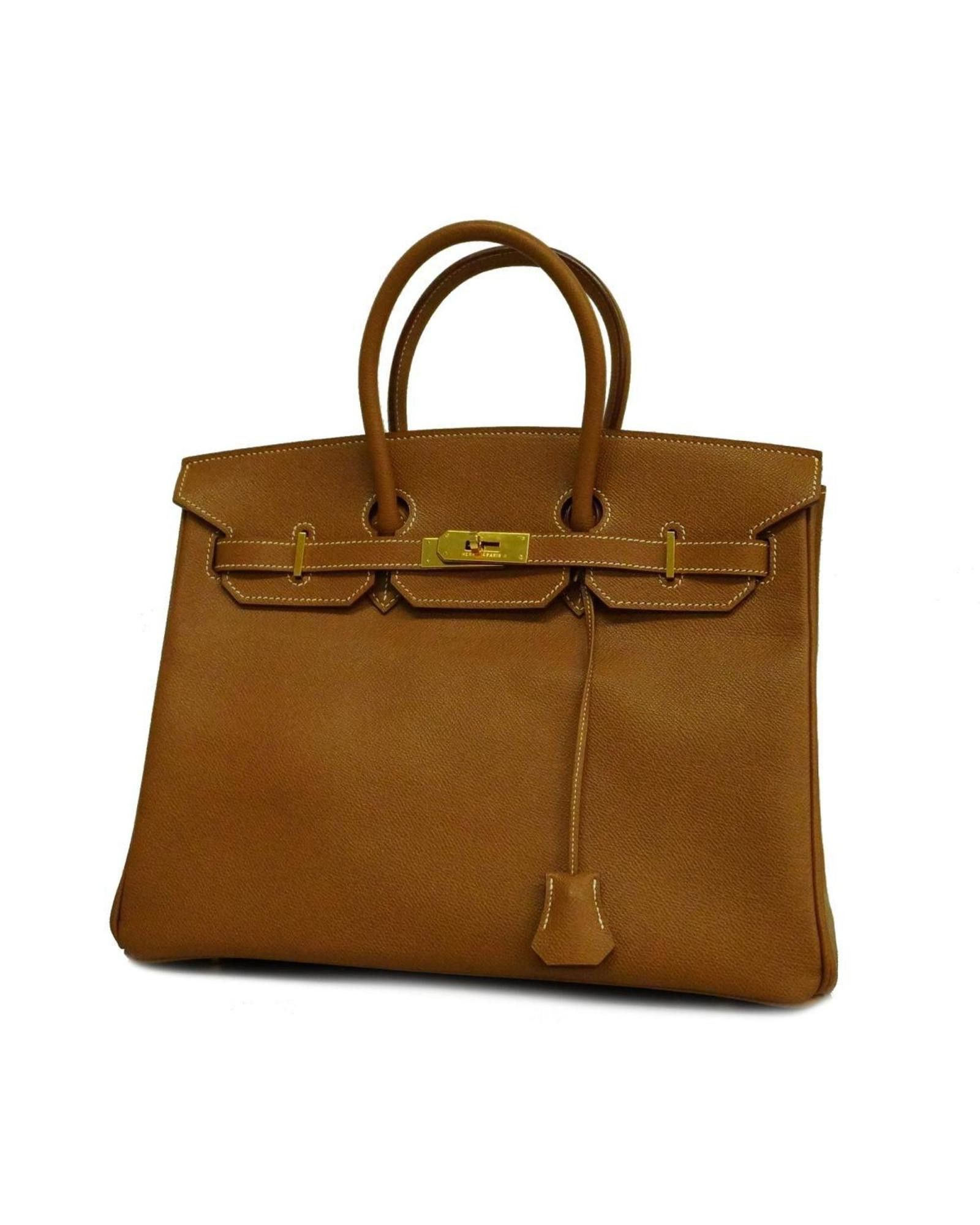 image of Hermes Elegant Leather Handbag With Accessories - Good Condition in Gold, Women's