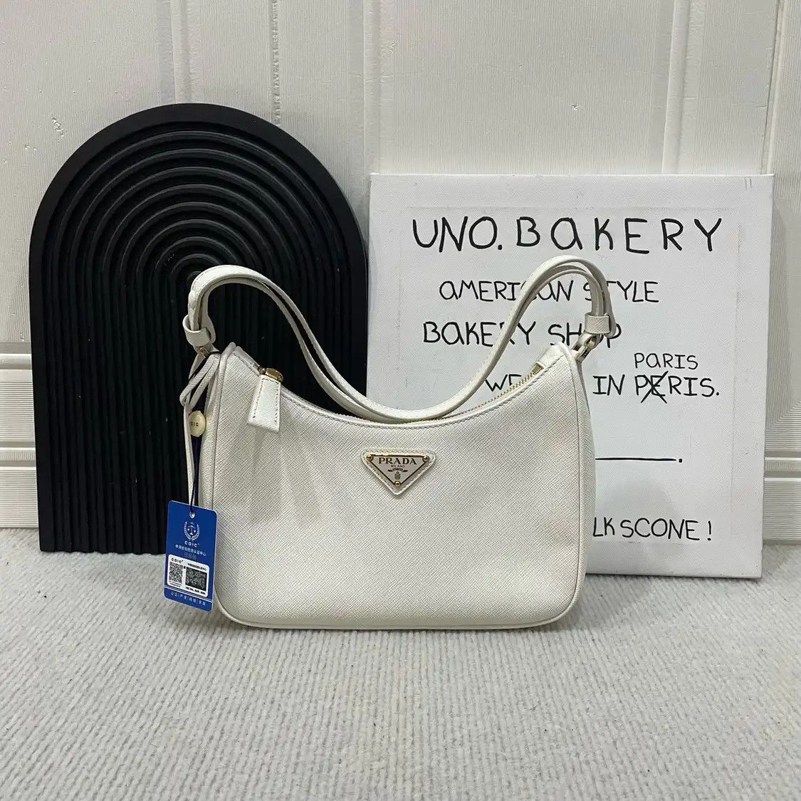 Prada PRADA Re-Edition 2005 white cowhide leather logo cross pattern shoulder bag Size ONE SIZE - 1 Thumbnail