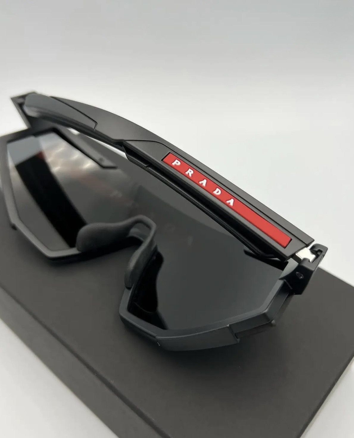 Prada sunglasses Linea Rossa PS 04WS DG006F