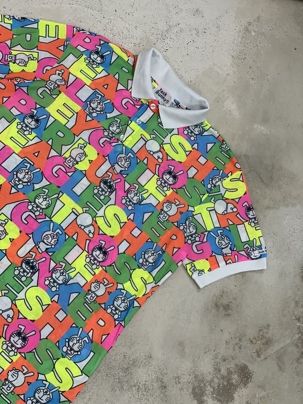 Anime × Japanese Brand × Psycho Bunny Jack Bunny Doraemon Polo Fullprint Wording Colorful Size US L / EU 52-54 / 3 - 5 Thumbnail