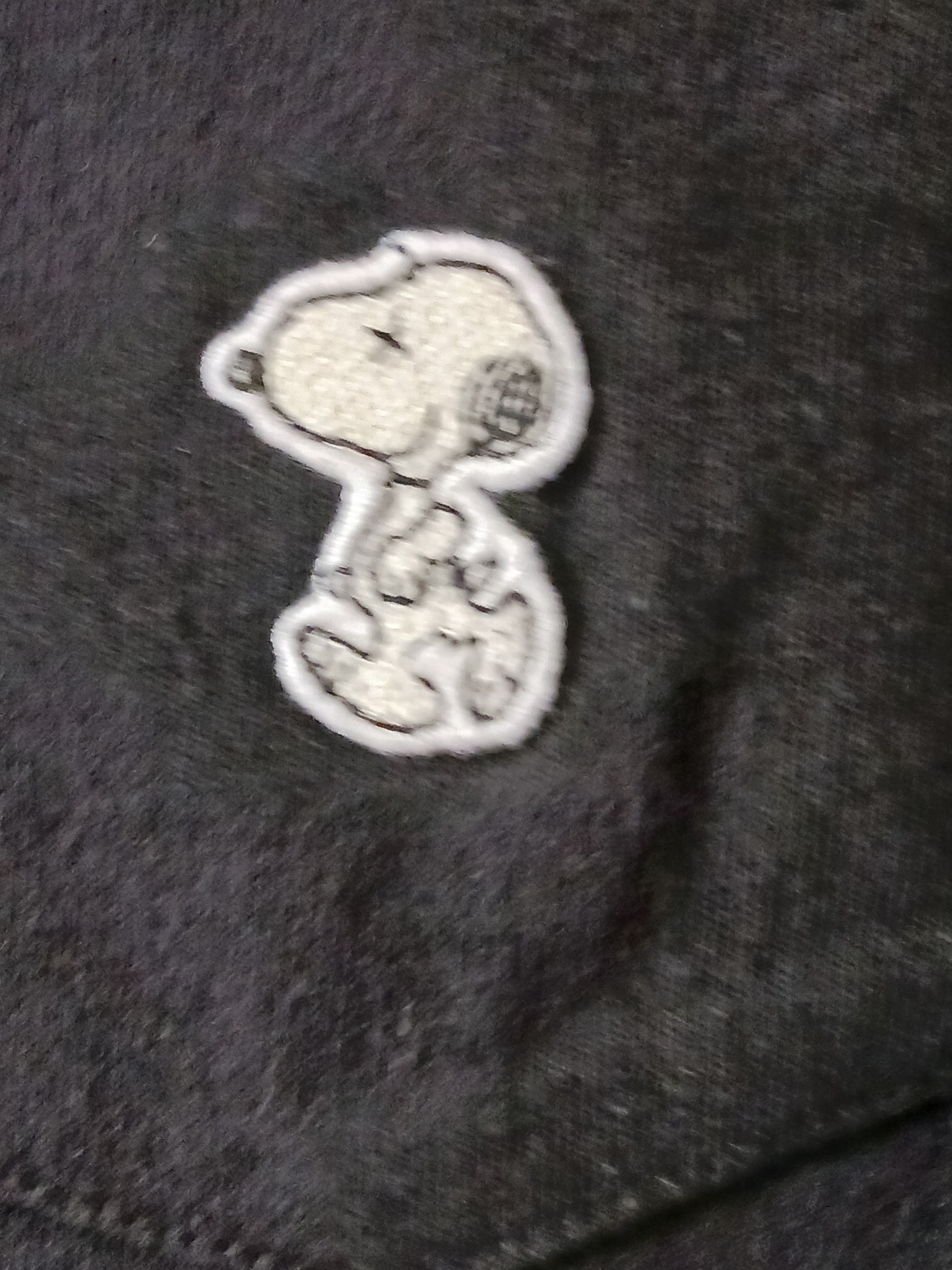 Kaws × Peanuts KAWS x Peanuts "Joe Kaws" Embroidered Pocket Tee Black -XS Size US XS / EU 42 / 0 - 5 Thumbnail