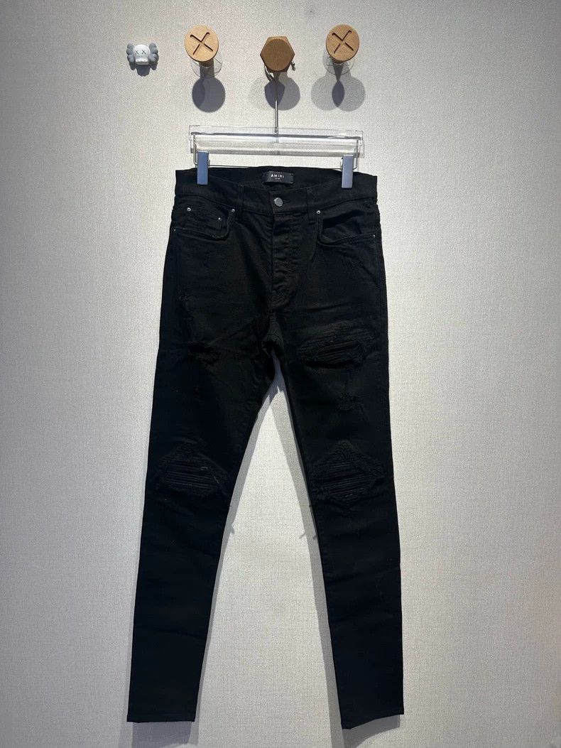 Amiri Amiri Black denim with leather panel mx2 jeans Size US 32 / EU 48 - 1 Thumbnail