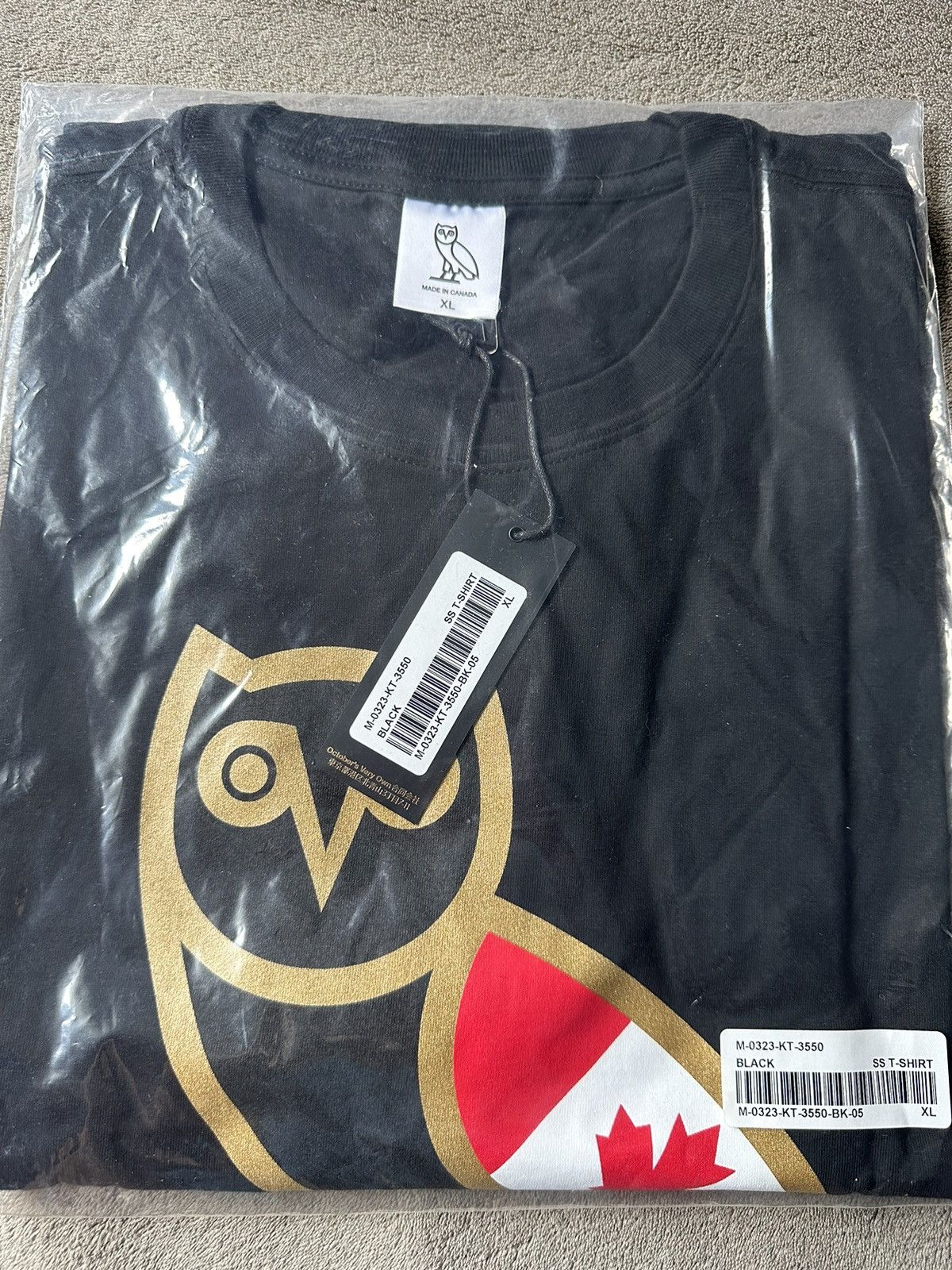 image of Drake x Octobers Very Own Ovo Canada Flag OG Owl T-Shirt Tee in Black, Men's (Size XL)