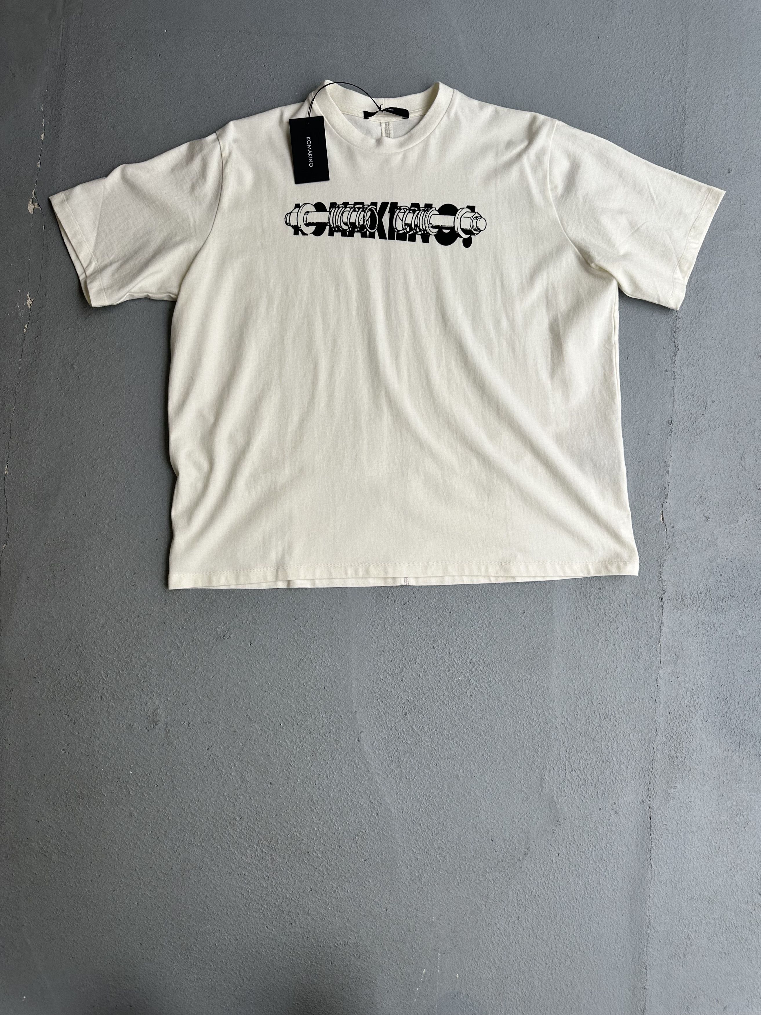 image of Komakino Hole Punch Logo T-Shirt in White, Men's (Size Medium)