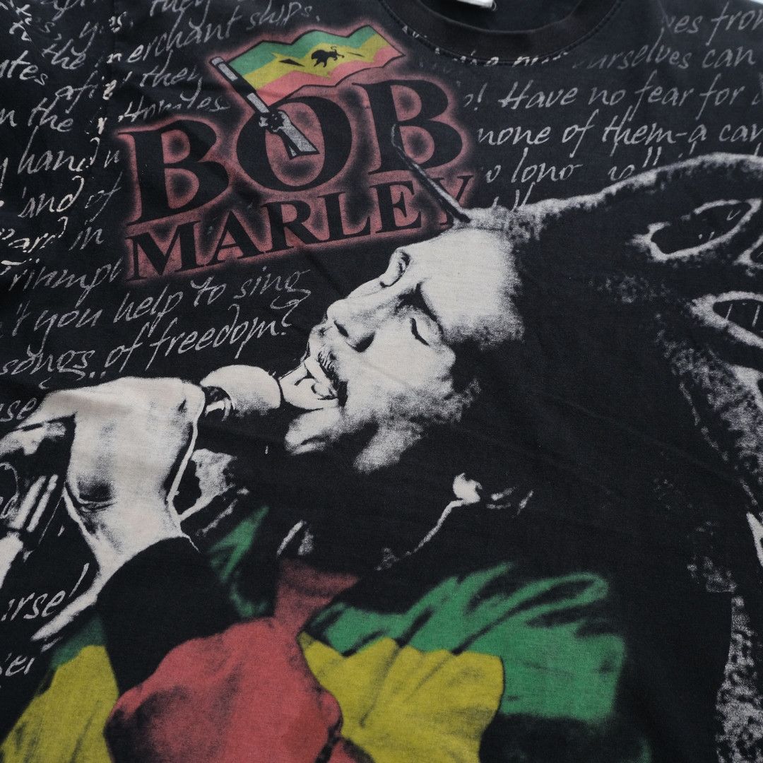 Bob Marley 1990s Bob Marley Redemption Song Lyrics AOP Black Tee unisex Size US L / EU 52-54 / 3 - 5 Thumbnail