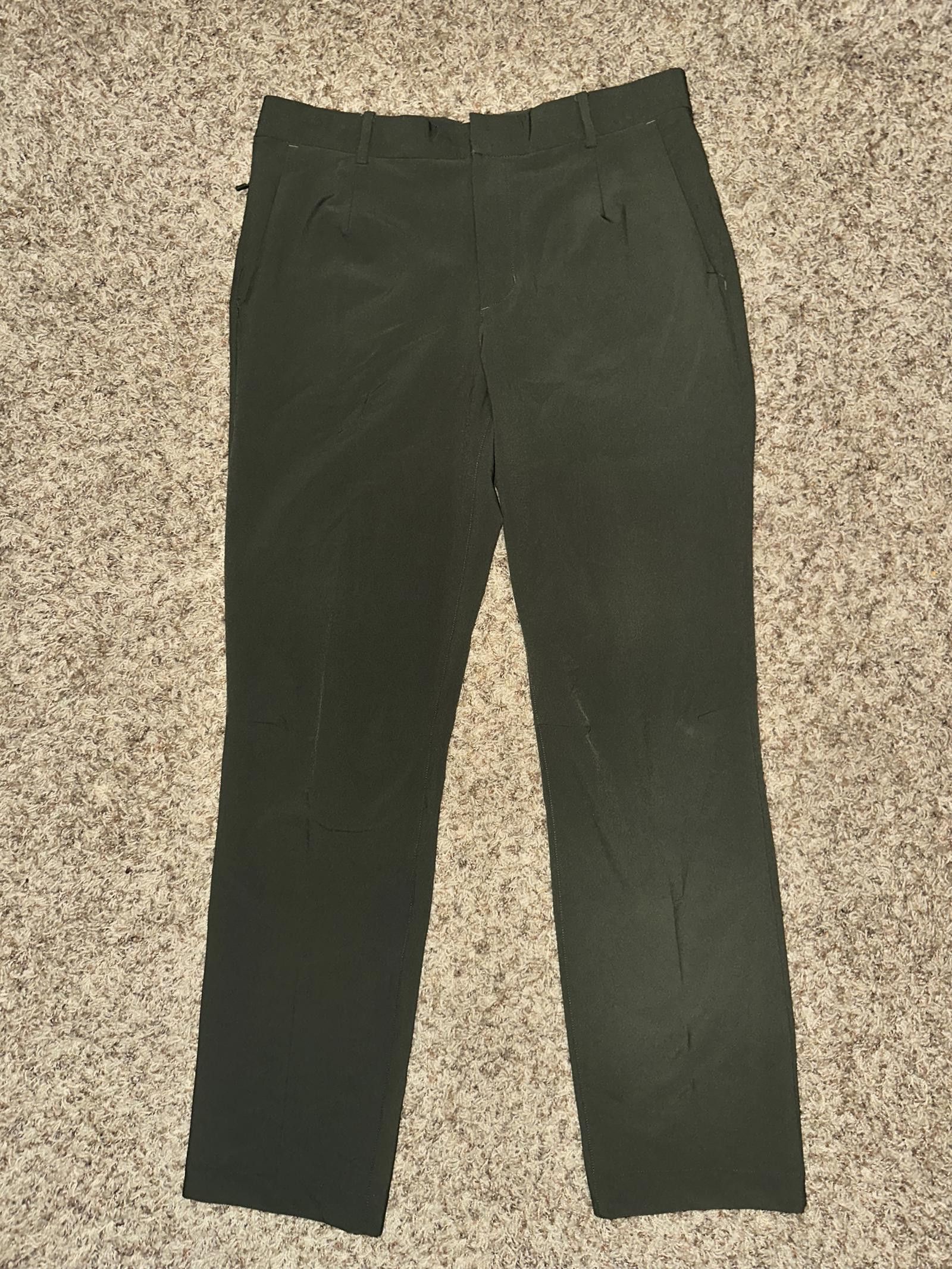 image of Nike Tiger Woods Adaptive Fit Flex Golf Pants 2020 Sample in Green, Men's (Size 32)