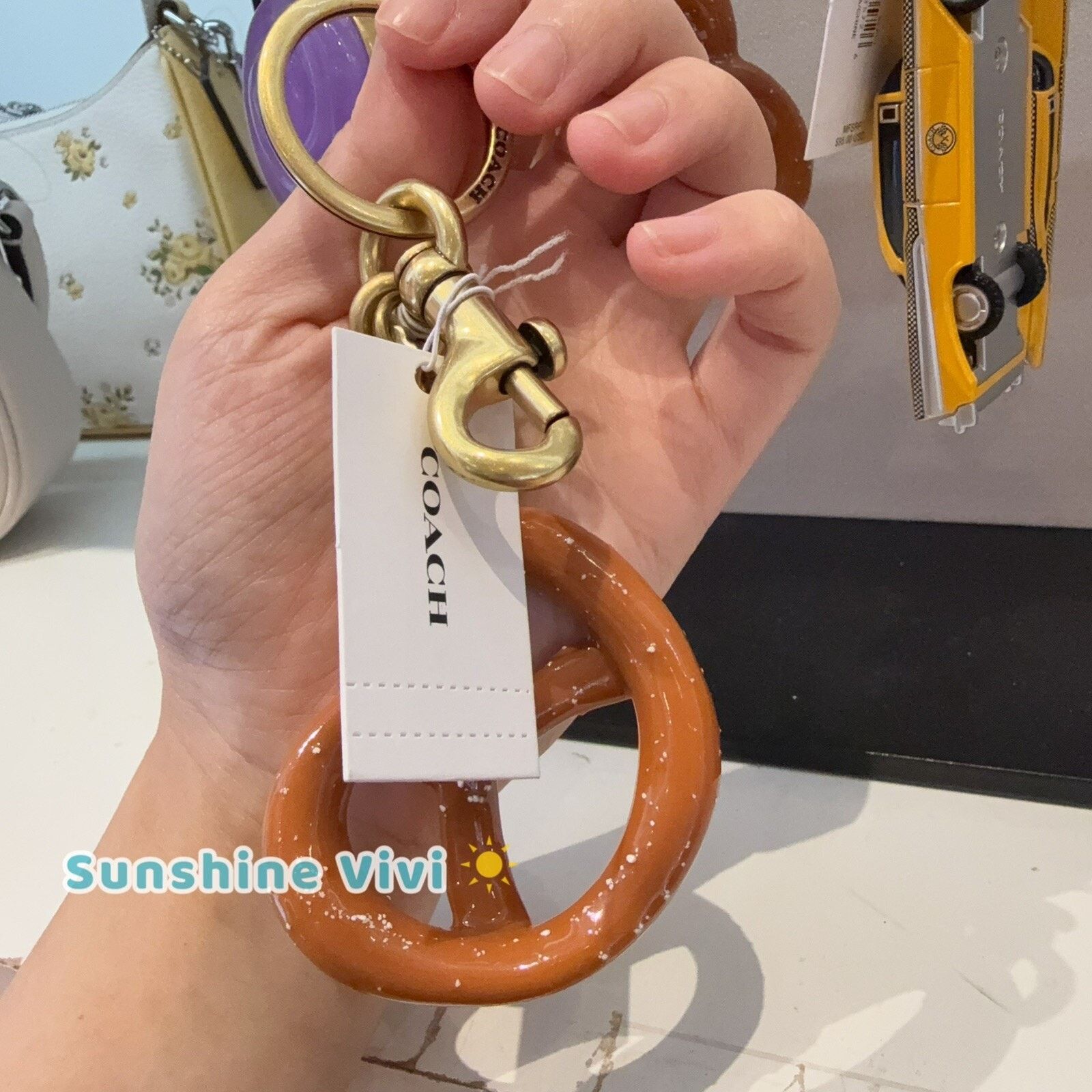 Coach NWT Coach Small Pretzel Bag Charm Keychain Brass Brown CY398