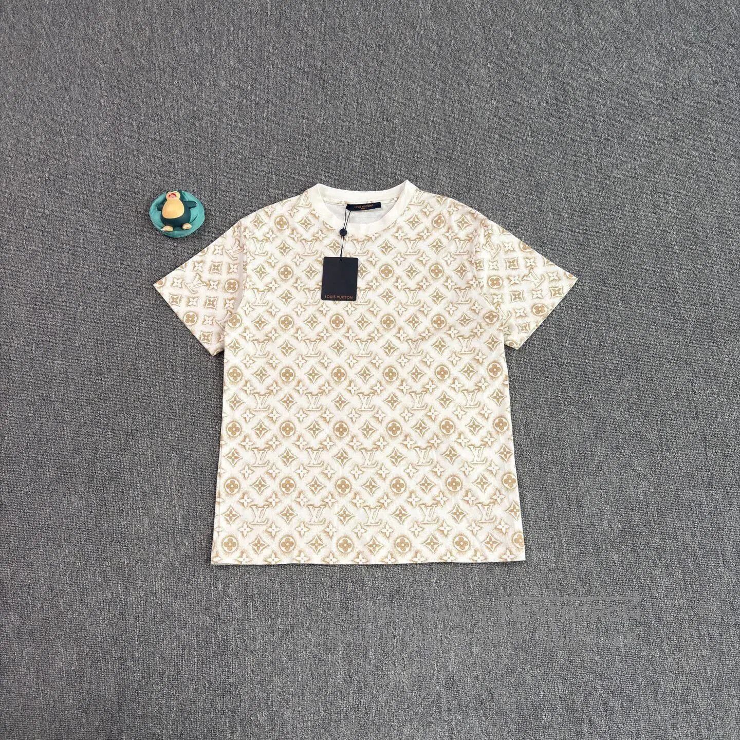 Beige Patterned Short-Sleeve Shirt.