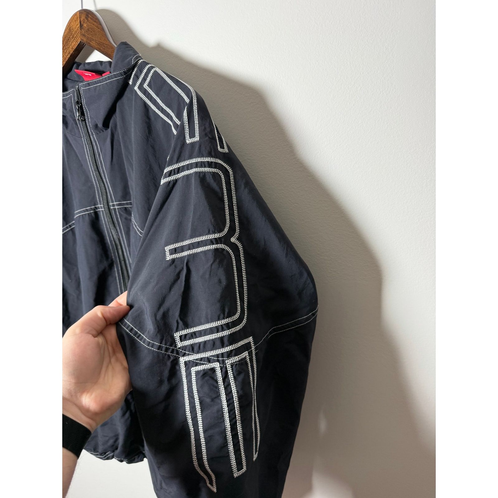 Supreme spellout embroidered track jacket black