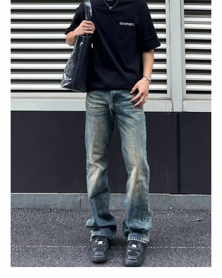 damaged washed faded gradient flared jeans