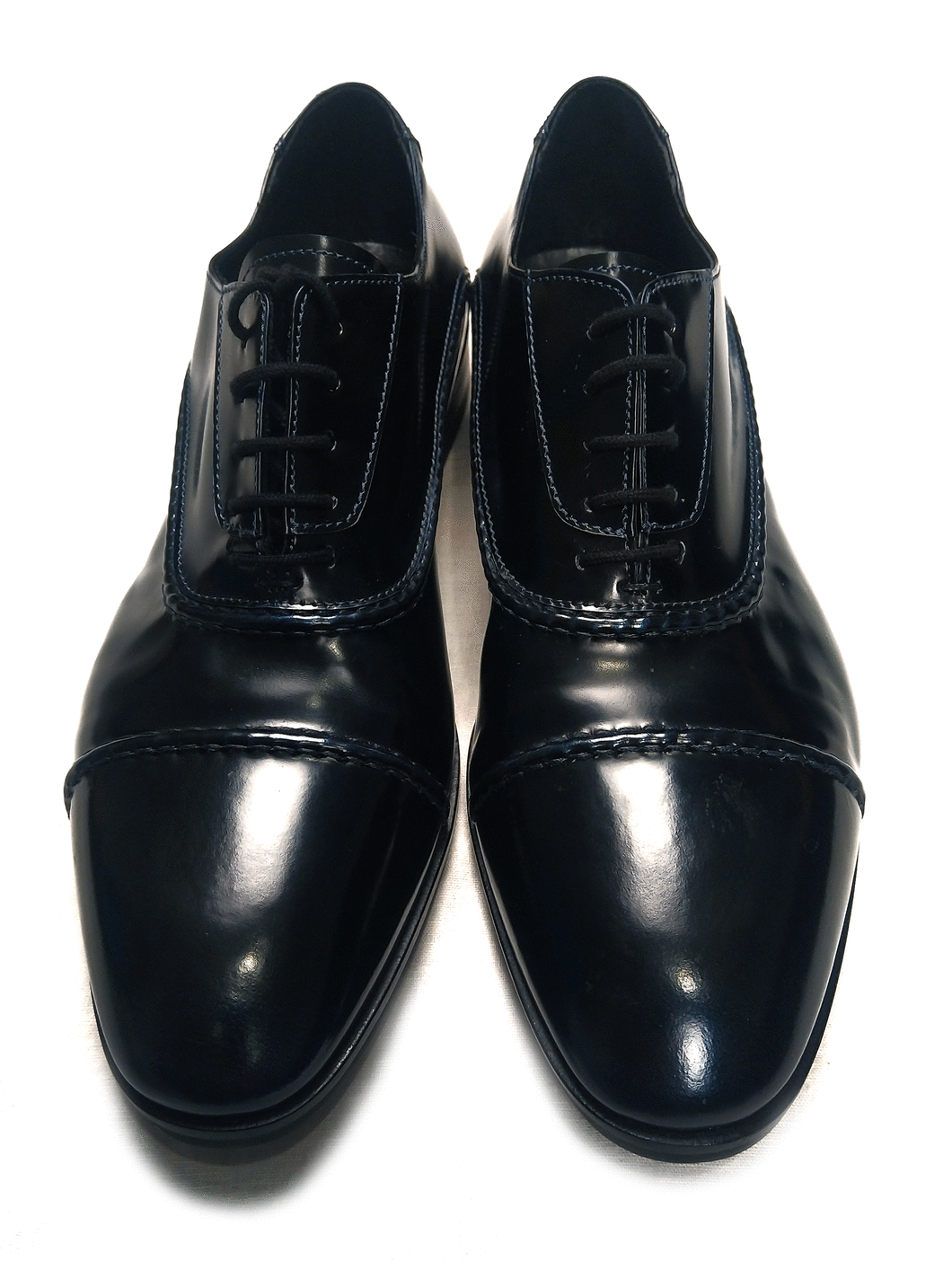 Italian Designers Debut. Italian men's leather black shoes with blue