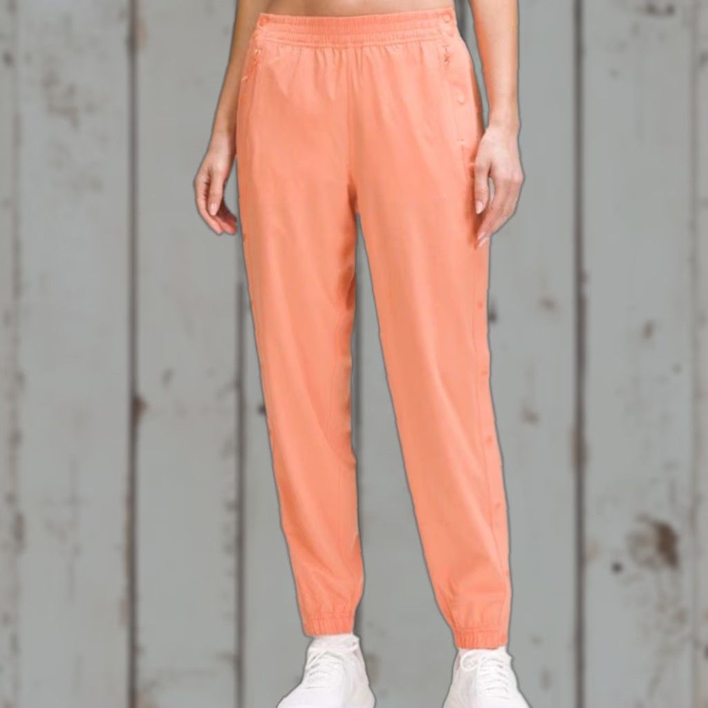 Lululemon NWT Lululemon tearaway mid-ride track pants Coral Kiss Women 4 Regular Orange Track Pants Women Size 27" / US 4 / IT 40 - 1 Thumbnail