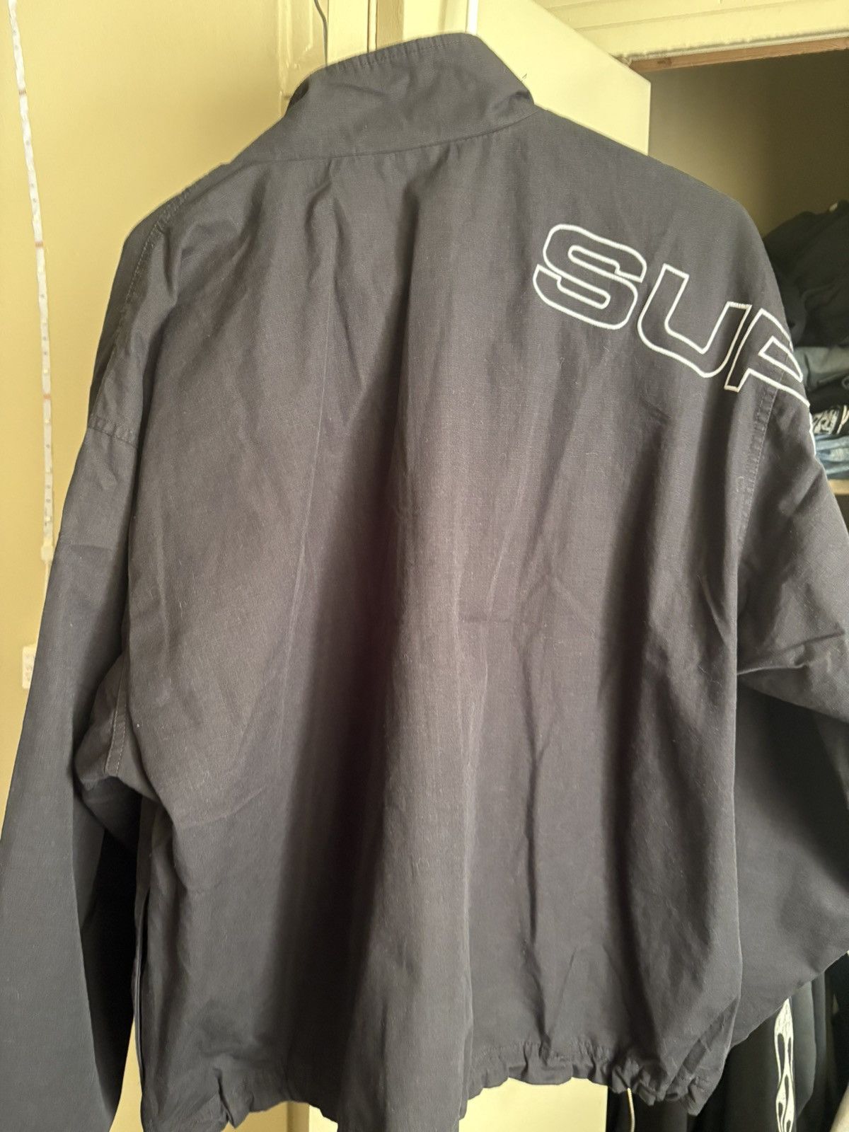 MサイズSpellout Embroidered Ripstop Tra Supreme Spellout Embroidered Ripstop Track Jacket (FW25) - $178