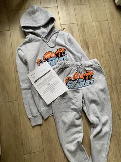Central Cee wearing Moncler Logo Patch Zipped Gilet, Nike Sportswear Tech  Fleece Full-Zip Blue Hoodie, Nike Sport…