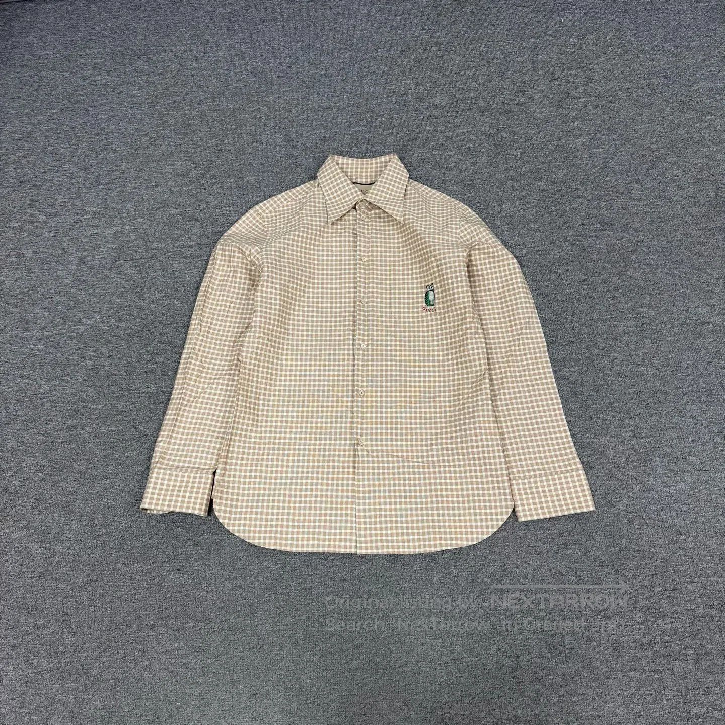 gucci embroidered checkered shirt with logo.