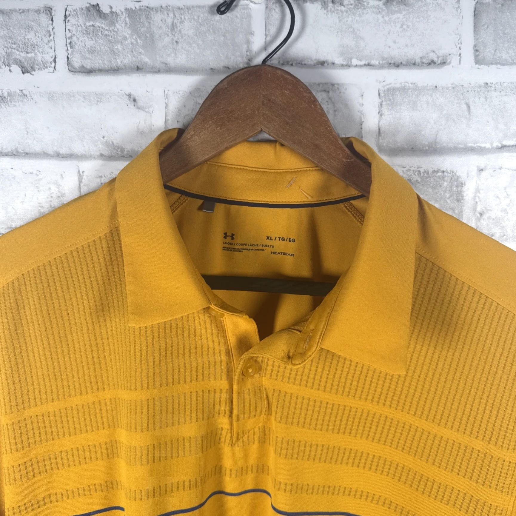 Under Armour VINTAGE? none. We must not include unless vintage. Here: Under Armour HeatGear Yellow Polo Shirt Mens XL Size US XL / EU 56 / 4 - 2 Thumbnail