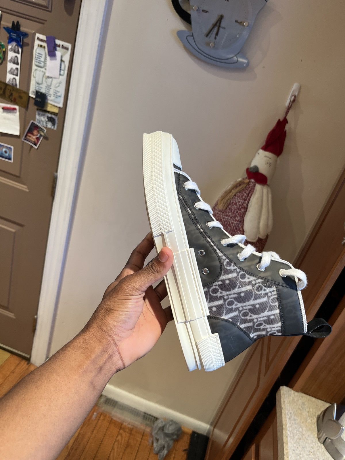 dior high top sneakers on feet