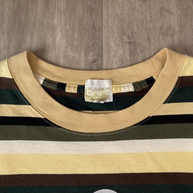 Bape × Kaws BAPE × KAWS Bendy College Logo T-Shirt a bathing ape NIGO Size US L / EU 52-54 / 3 - 6 Thumbnail