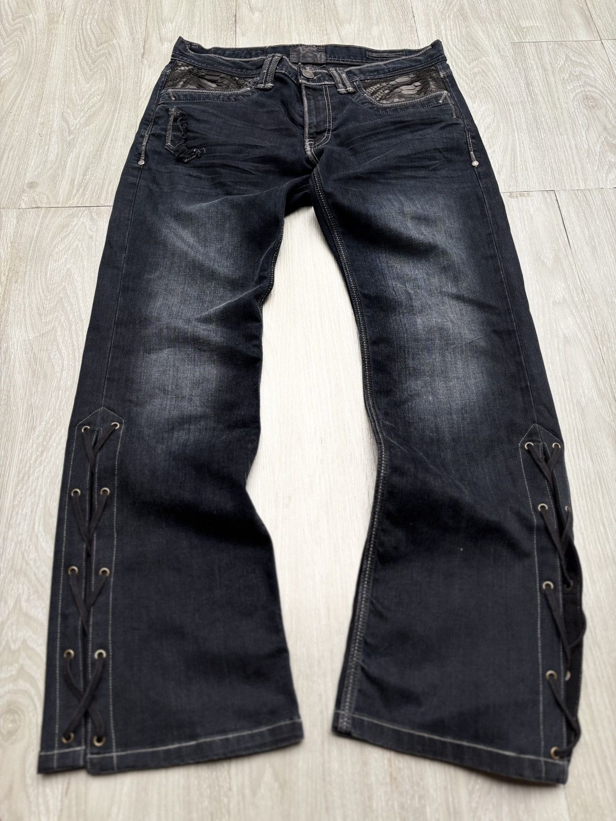 TAVERNITI lace up flare jeans