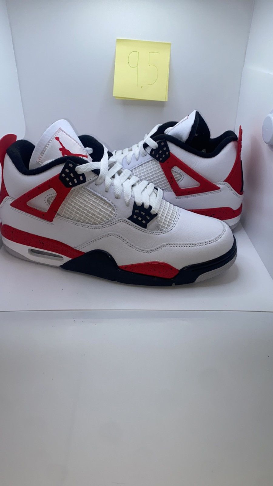 image of Nike Air Jordan 4 Retro Shoes in Red, Men's (Size 9.5)