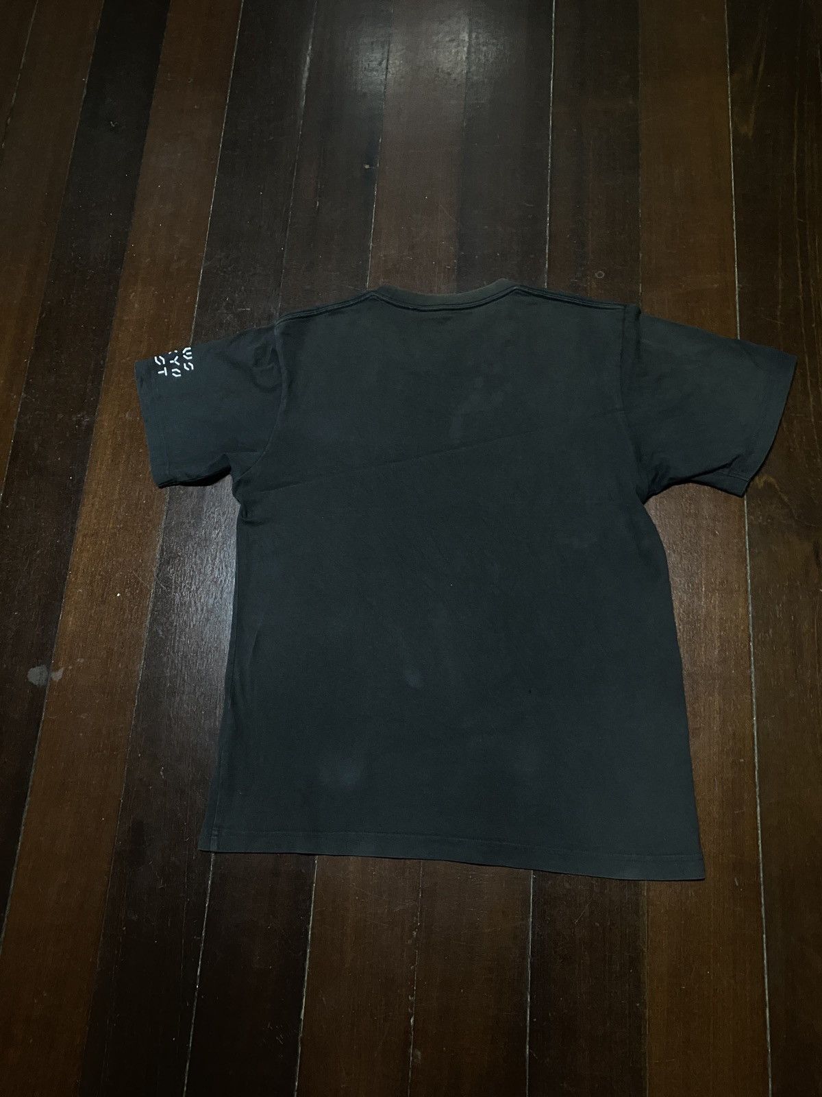Hypebeast × Kaws FIRE 🔥🔥 UNIQLO X KAWS TOKYO FIRST SAD DESIGN Size US L / EU 52-54 / 3 - 8 Thumbnail