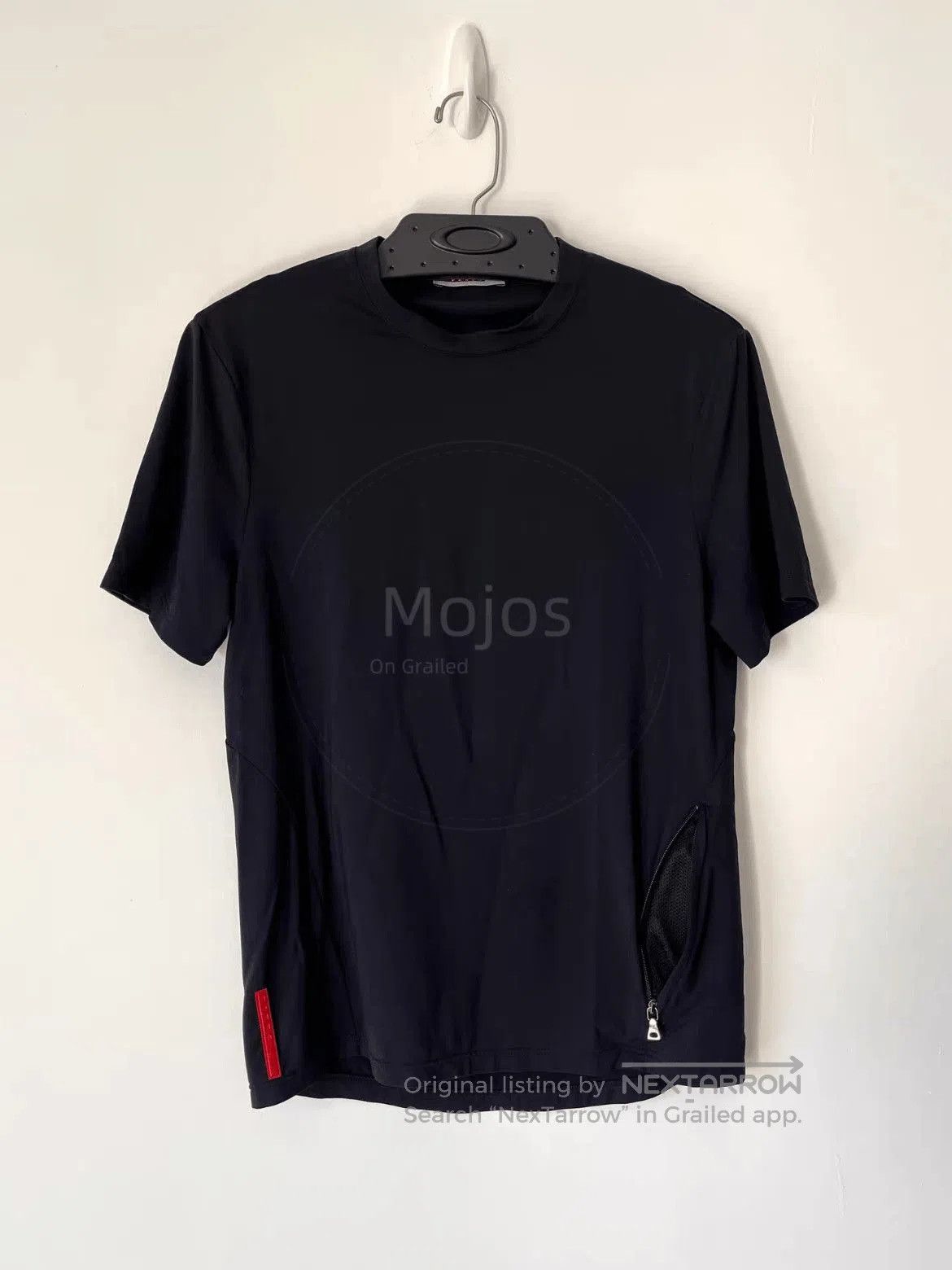 Prada Sports Zipper Tee.