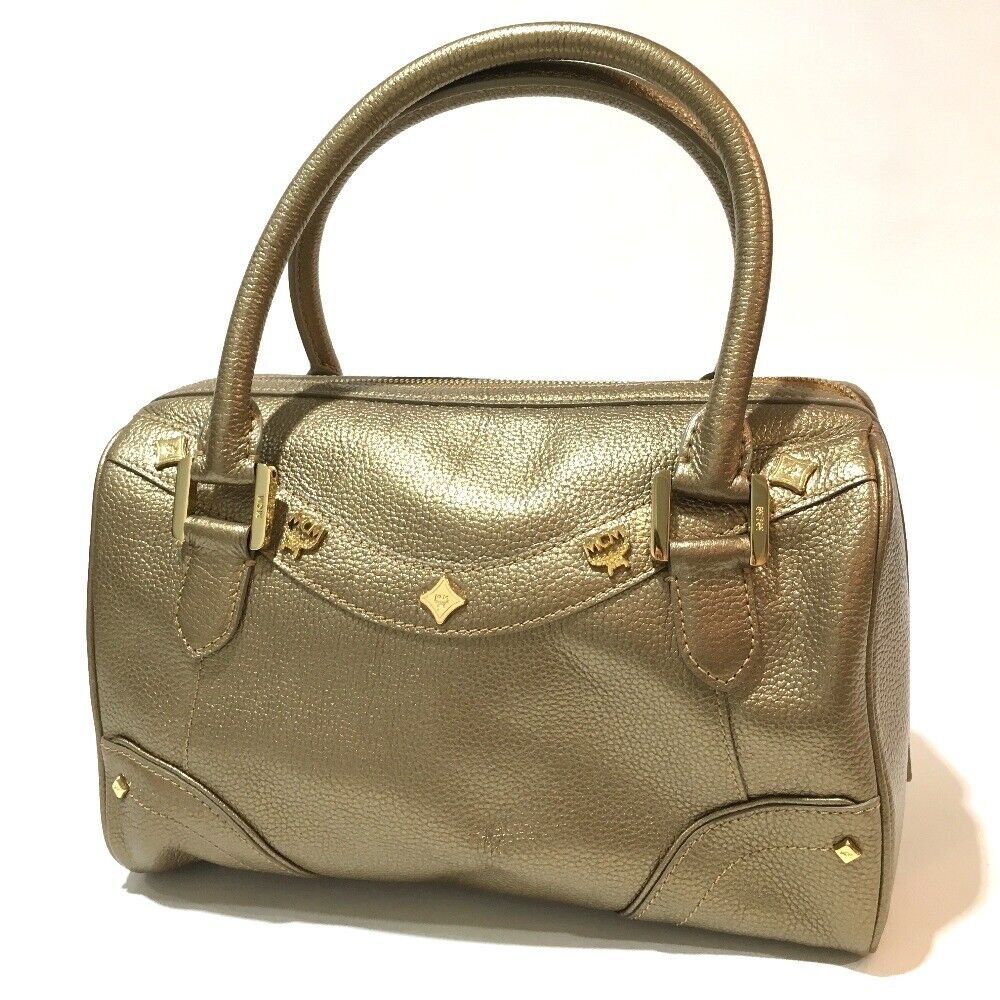 MCM MCM Logo Studs Mini Duffle Bag Hand Bag Gold Size ONE SIZE - 1 Thumbnail