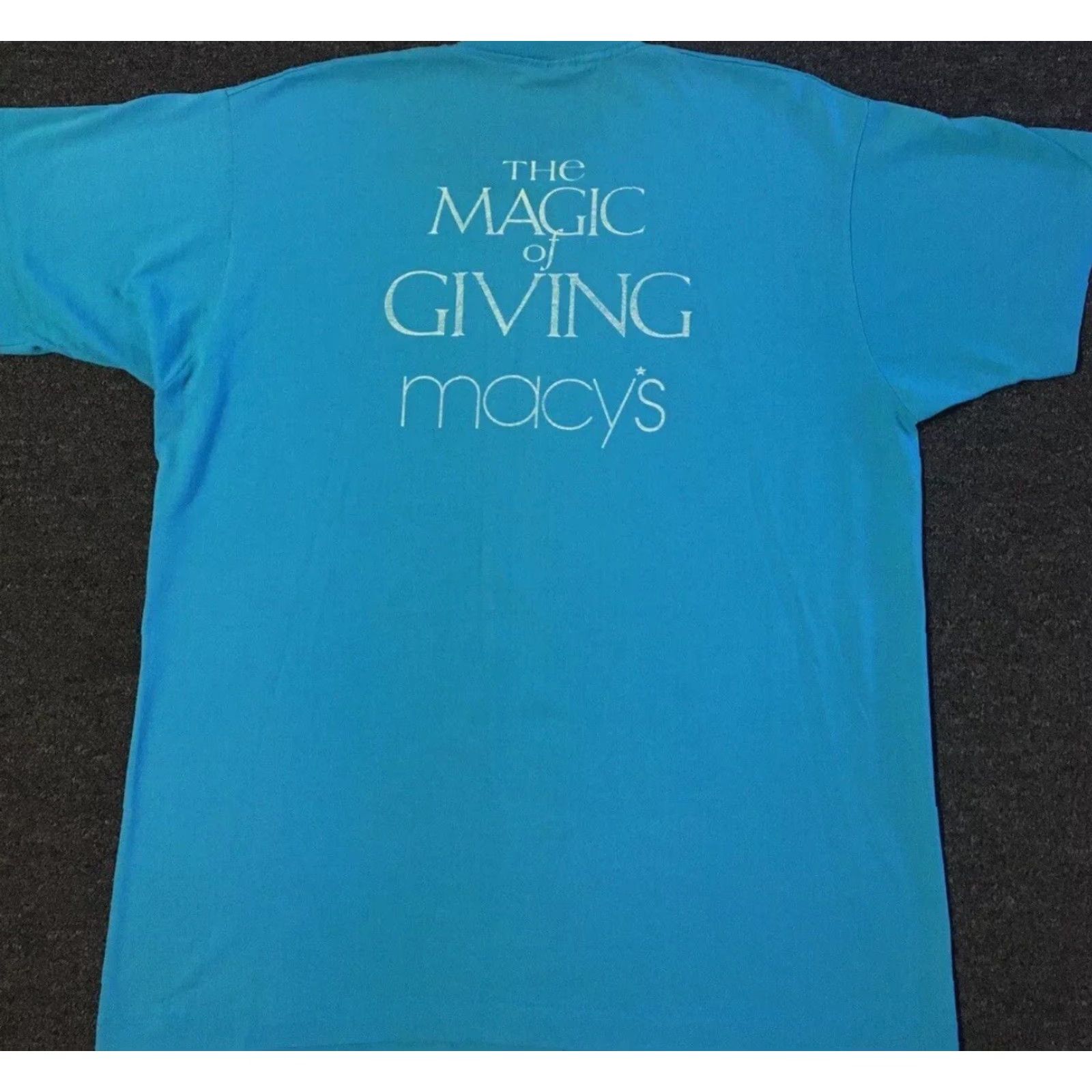 Vintage VINTAGE Macy's The Magic Of Giving T-Shirt XL Blue 90s Grunge Designer 80s 90s Biker Punk Rock USA Mens Short Sleeve Single Stitch Size US XL / EU 56 / 4 - 2 Thumbnail