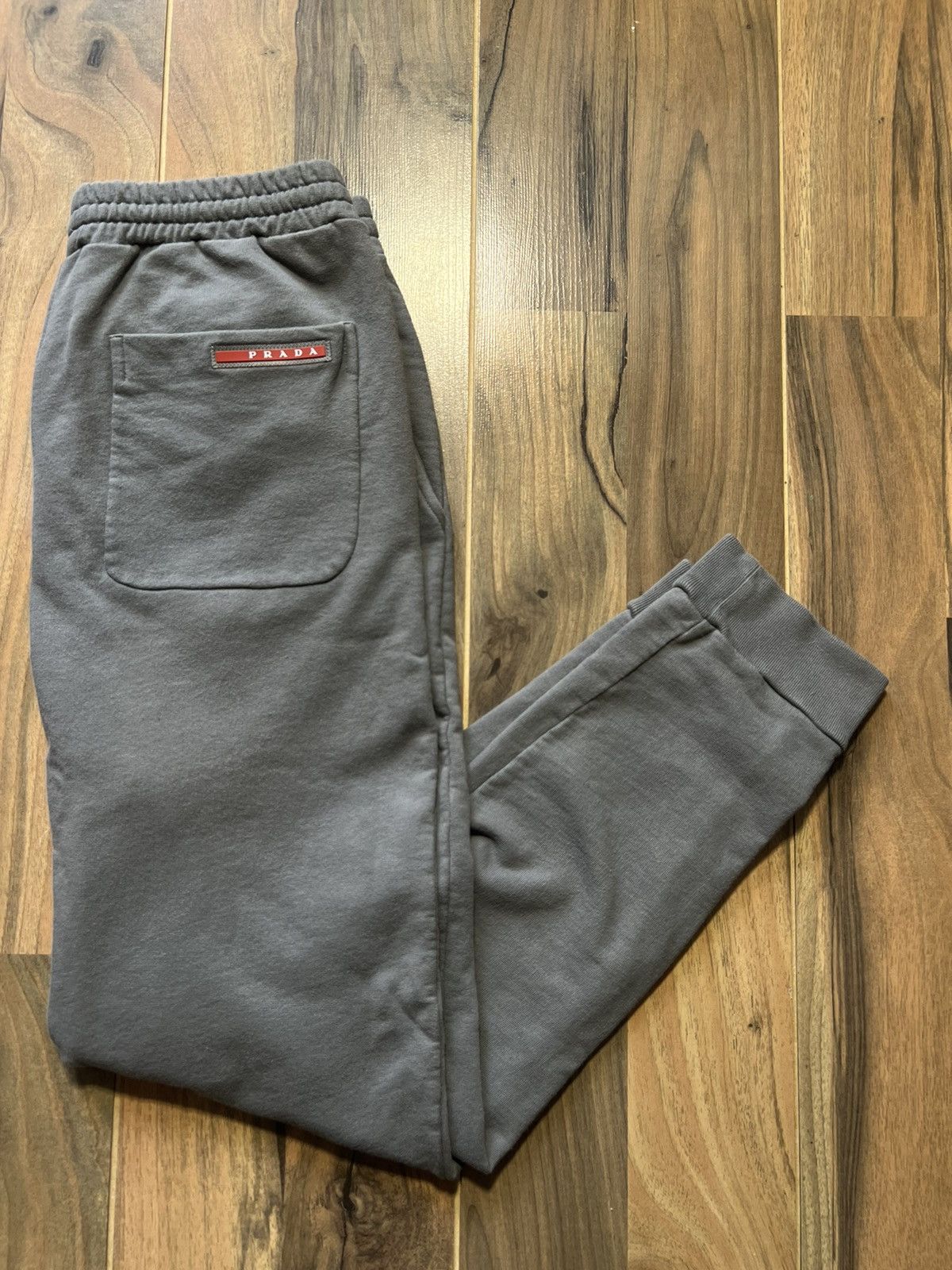 Prada Prada red tap pants joggers sweat Size US 30 / EU 46 - 1 Thumbnail