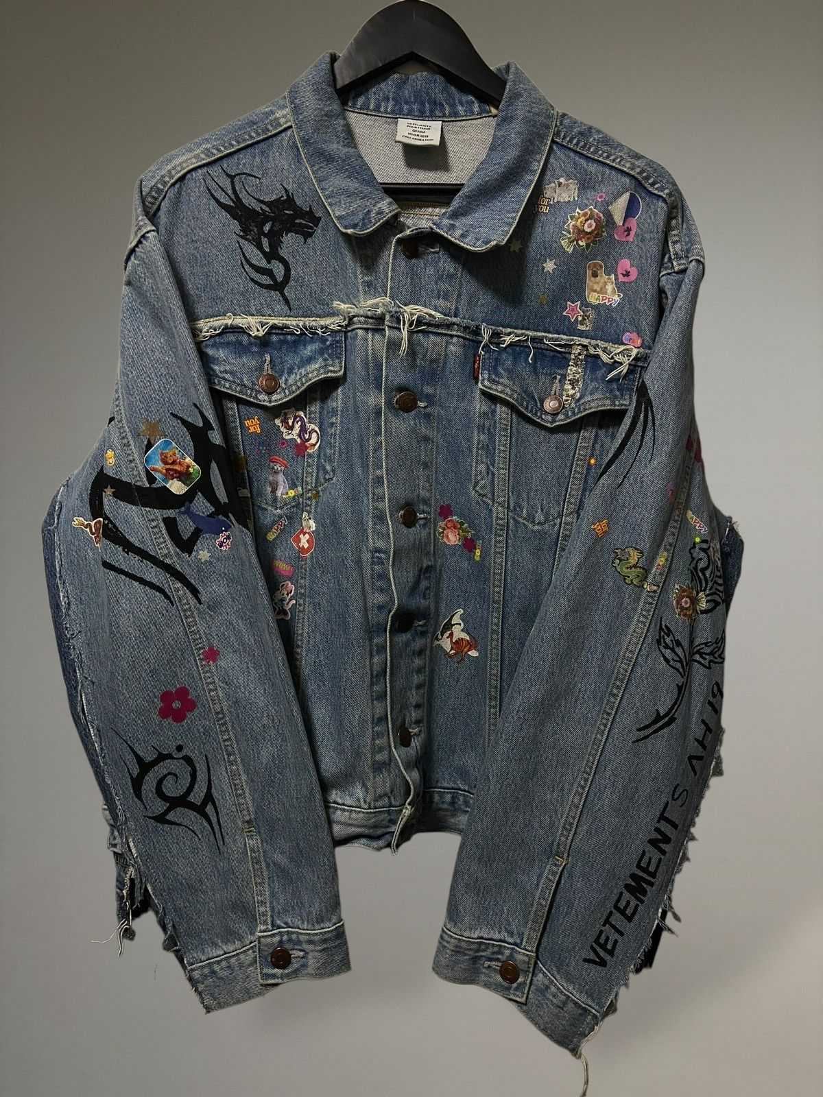 image of Vetements Sticker Embellished Distressed Denim Jacket in Blue, Men's (Size XS)