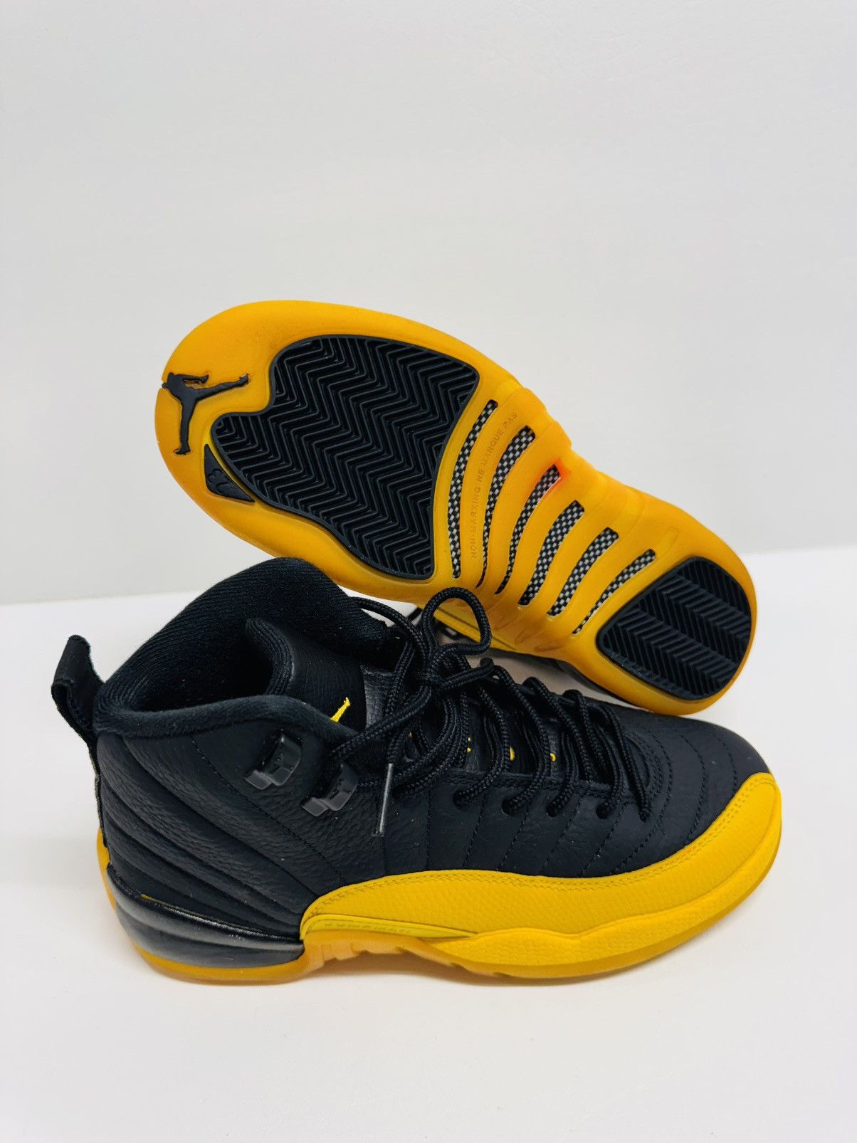 Jordan Brand Air Jordan 12 Retro Black University Gold Size US 5.5 / EU 38 - 1 Thumbnail