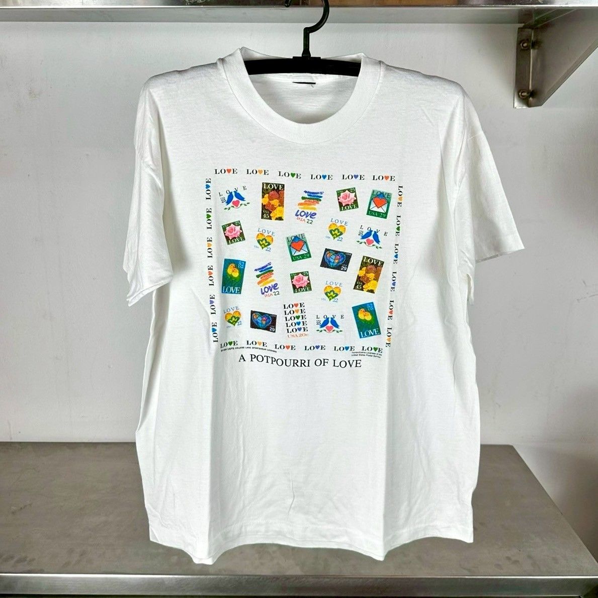 Vintage ​​1994 A Potpurri of Love USPS Stamp Artwork​ T-shirt Size US XL / EU 56 / 4 - 1 Thumbnail
