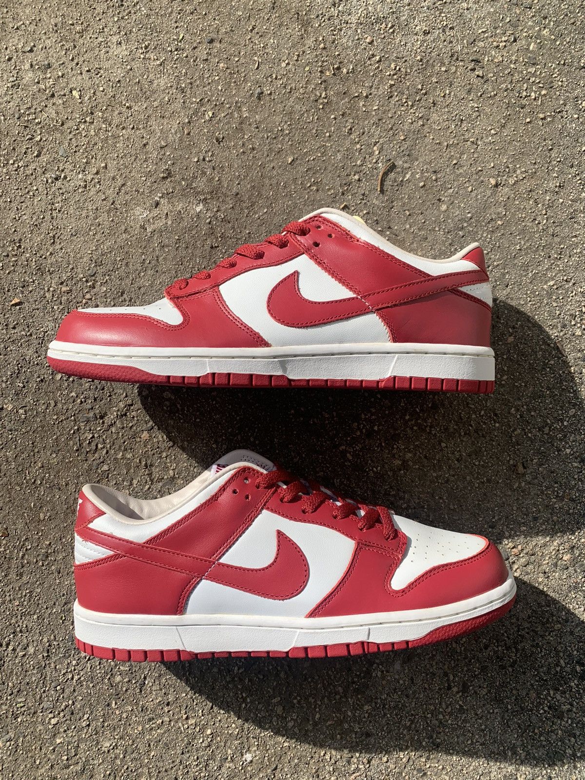 image of Vintage Nike Dunk Low St Johns 2004 OG Shoes in Red, Men's (Size 8.5)