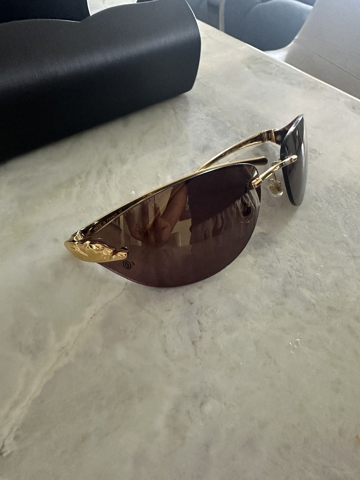 image of Cartier Glasses/shades in Gold, Men's