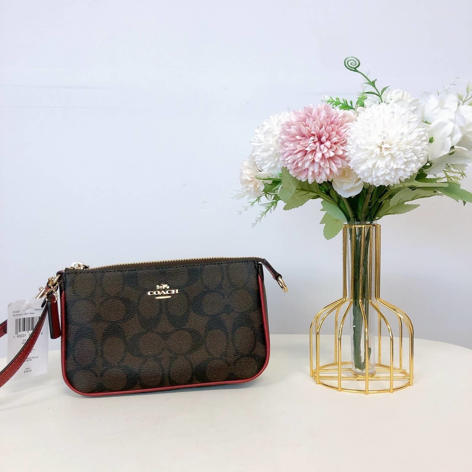 image of Coach C3308 Nolita 19 In Signature Canvas In Brown 1941 Red, Women's