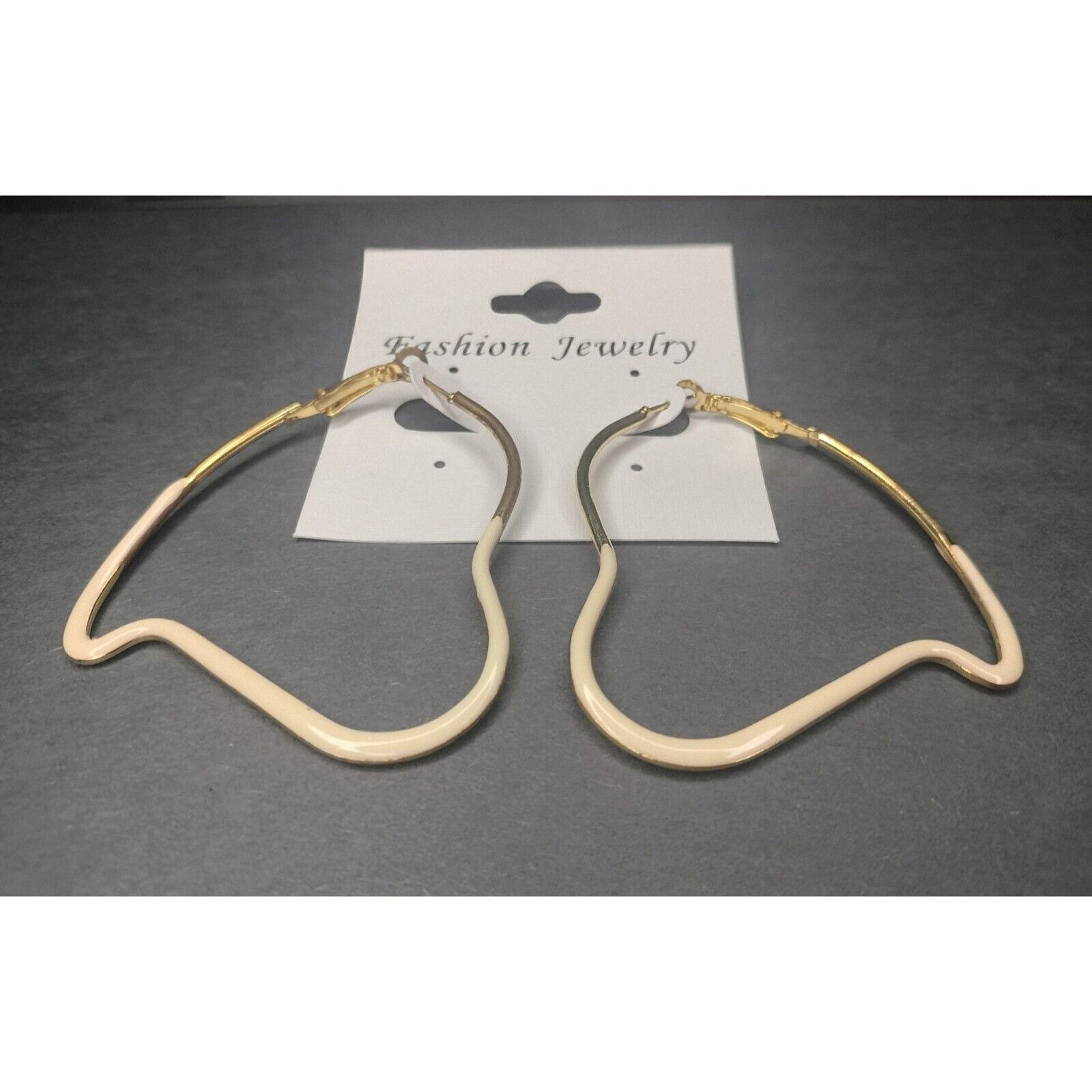 Other Hoop Earrings Fashion Jewelry Eggshell White Asymmetrical He Size ONE SIZE - 10 Thumbnail