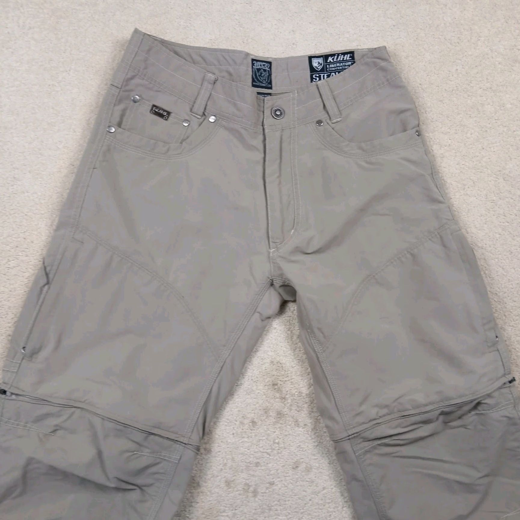Vintage Kuhl Liberator Convertible Pants Men 30x32 Beige Cargo Pocket Logo Hiking Outdoors Ultra Stretch Regular Rise 30" Inseam 32" Size US 30 / EU 46 - 3 Thumbnail