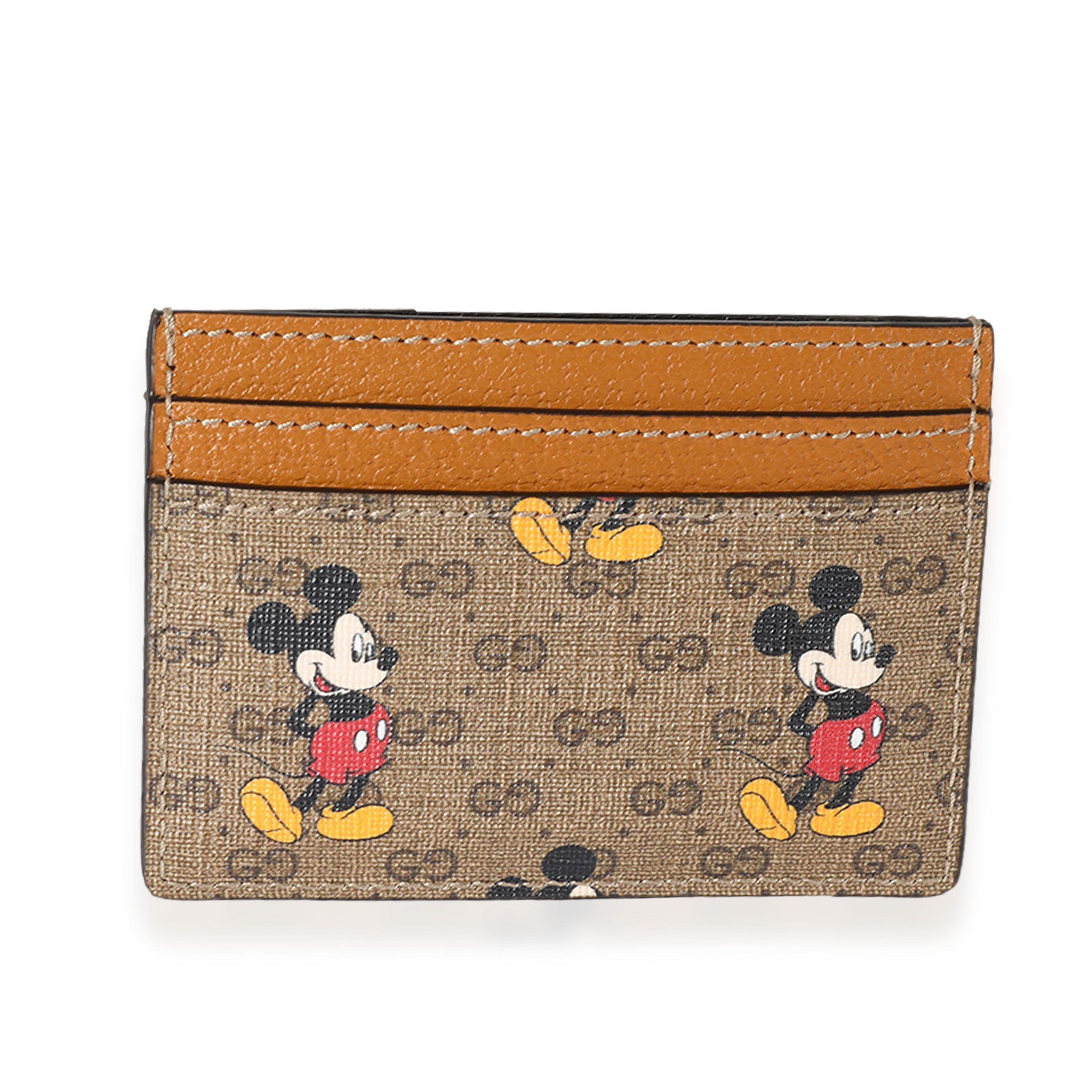 image of Gucci X Disney Vintage GG Supreme Mickey Mouse Card Case in Brown, Women's