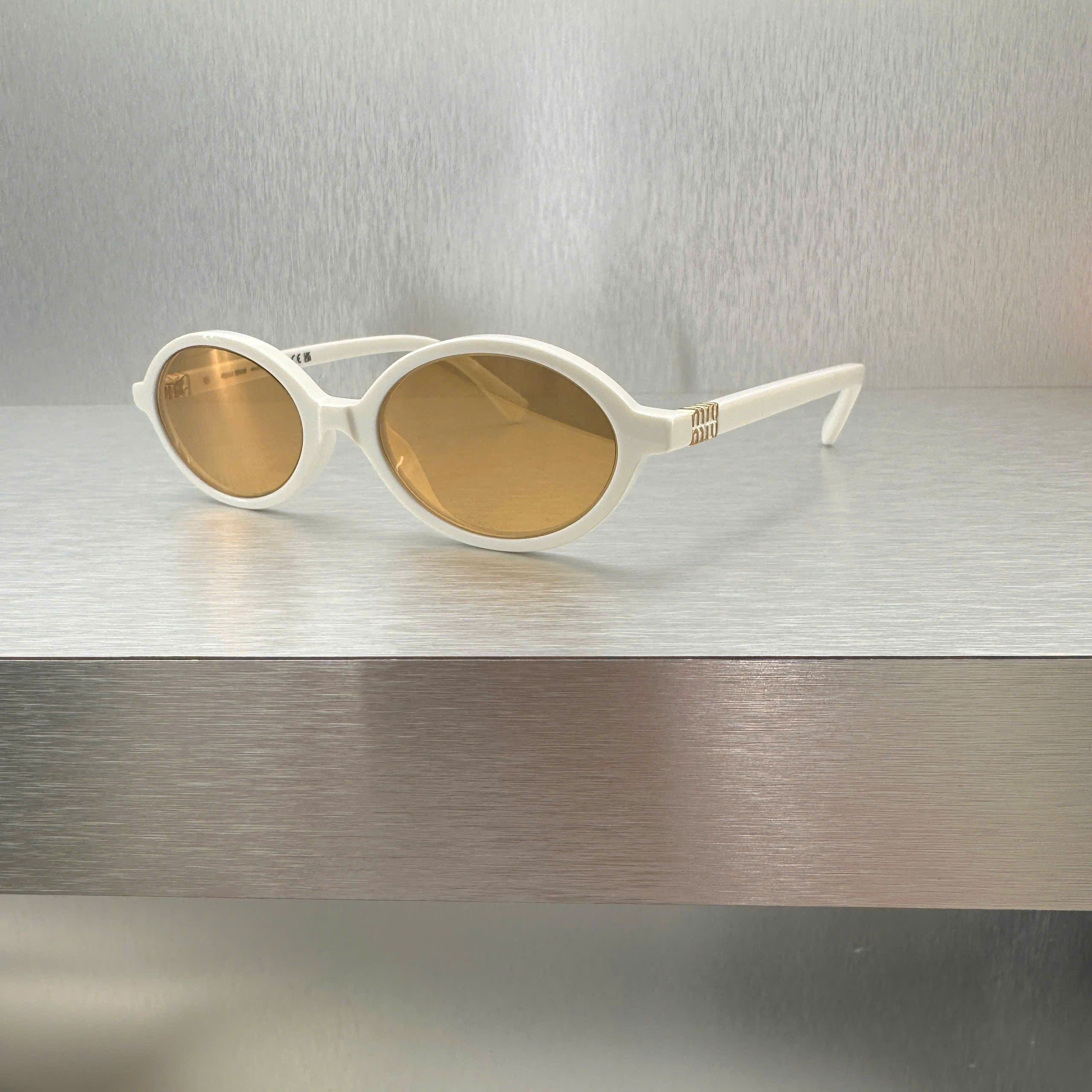 Miu Miu MIU MIU MU 04ZS 14240D Eyewear WHITE Size ONE SIZE - 7 Thumbnail