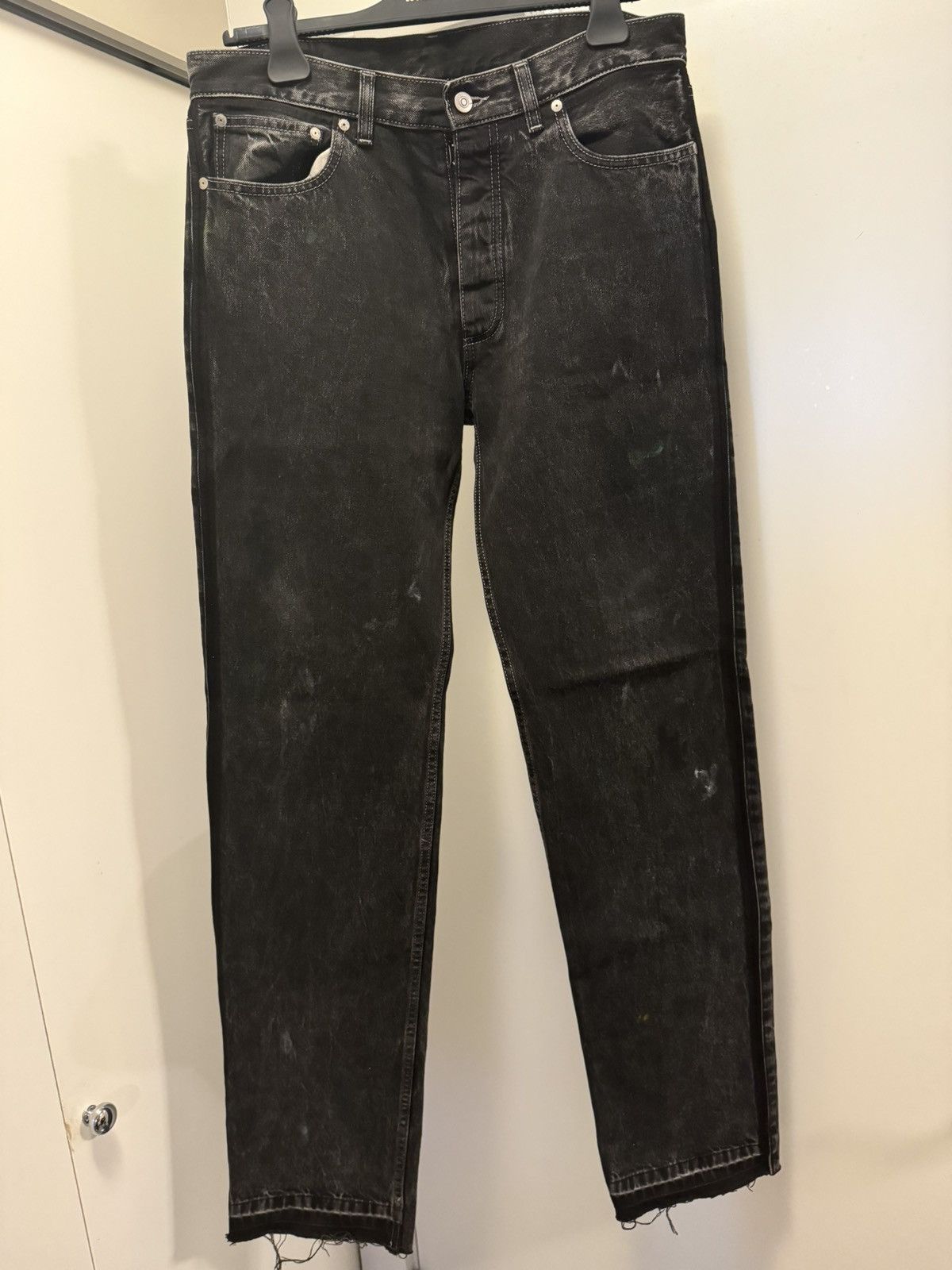 image of Maison Margiela Paint Splatter Jean With Distressed Bottom Hem in Black, Men's (Size 34)