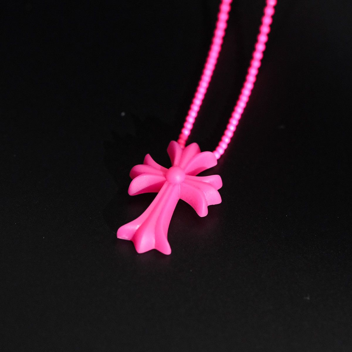 image of Chrome Hearts Silichrome - Tiny Cross Necklace in Neon Pink, Women's