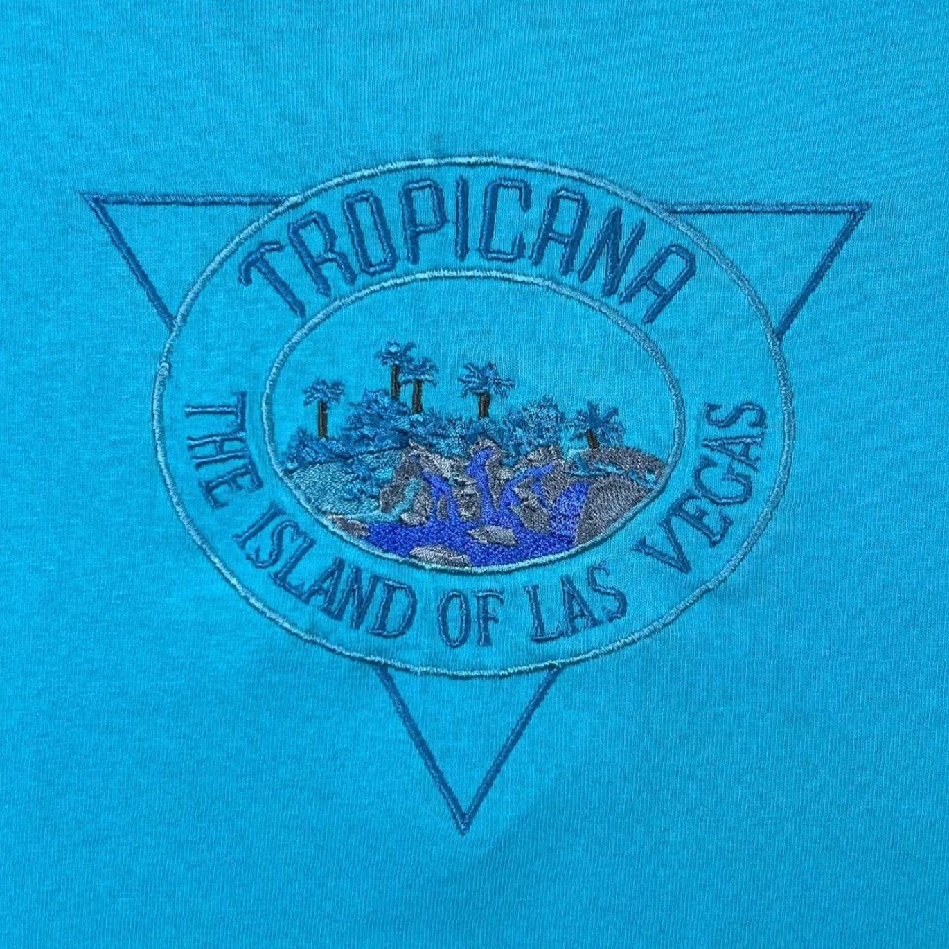 Vintage Vintage Tropicana The Island Of Las Vegas Embroidered Single Stitch T-Shirt XXL Desert Heat Men 2XL Turquoise Vintage 90s Mens Shirt Size US XXL / EU 58 / 5 - 4 Thumbnail