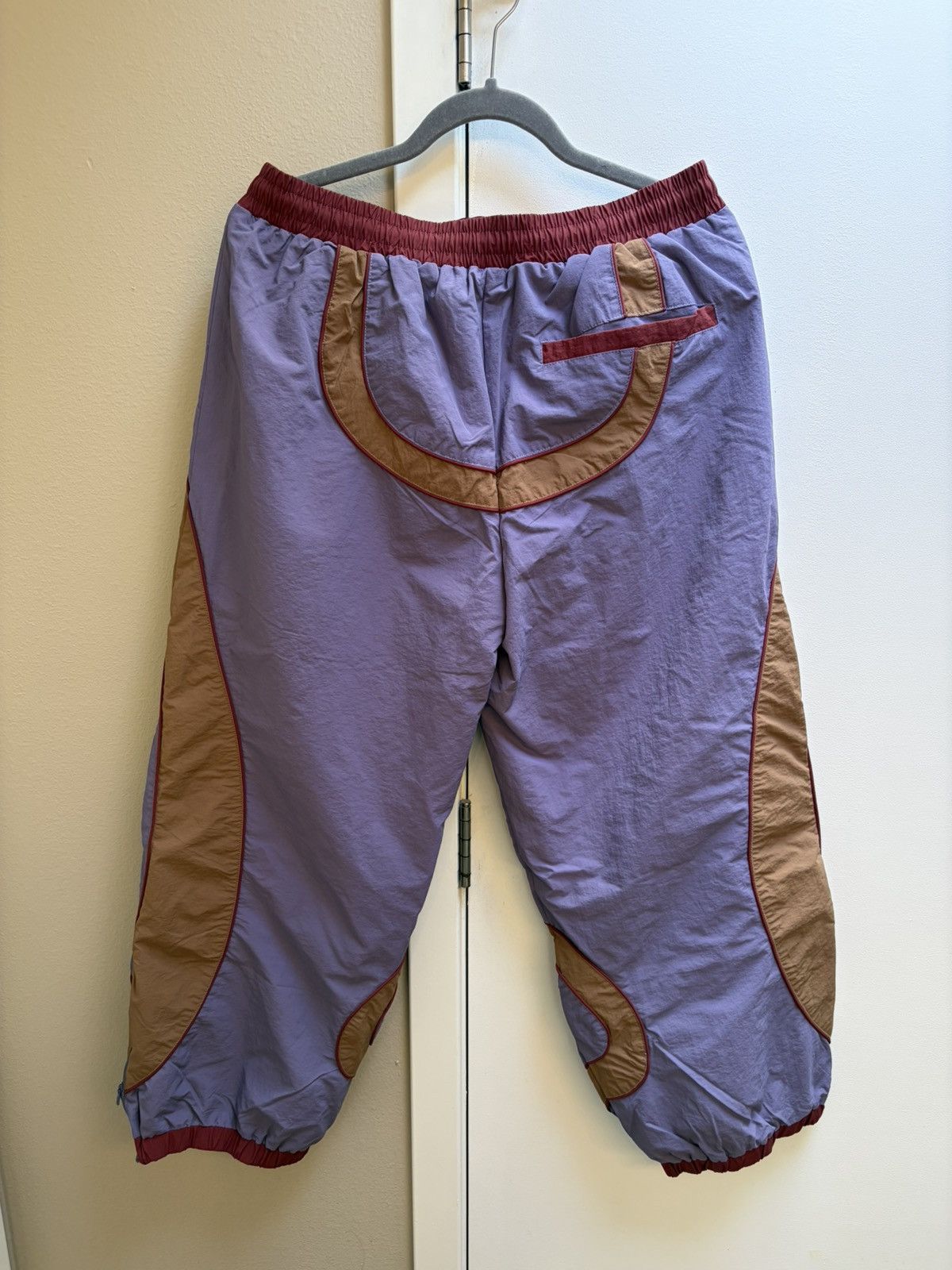 KidSuper RONALDINHO X KIDSUPER WINDBREAKER PANTS [BROWN / BLUE / RED] Size US 31 - 2 Thumbnail
