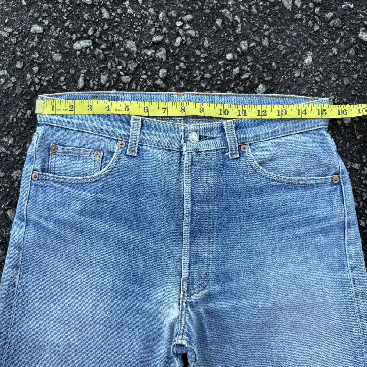 Levi's Vintage Clothing VINTAGE LEVI’S 501 USA LIGHT WASH RIPPED JEAN DENIM PANTS Size US 31 - 6 Thumbnail