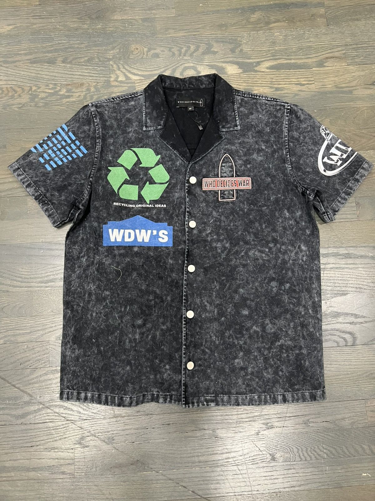 Recycle motif who decides war work shirt