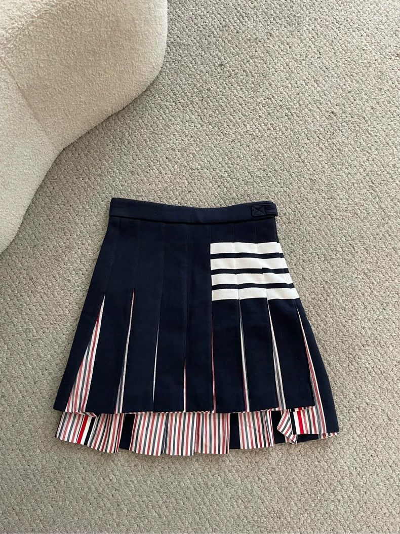 Thom browne Dark blue classic four-striped pleated skirt sh