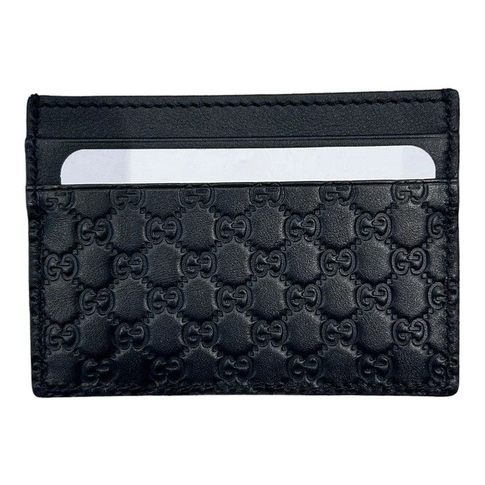 image of Gucci Debossed Monogram Navy Card Holder in Black, Men's
