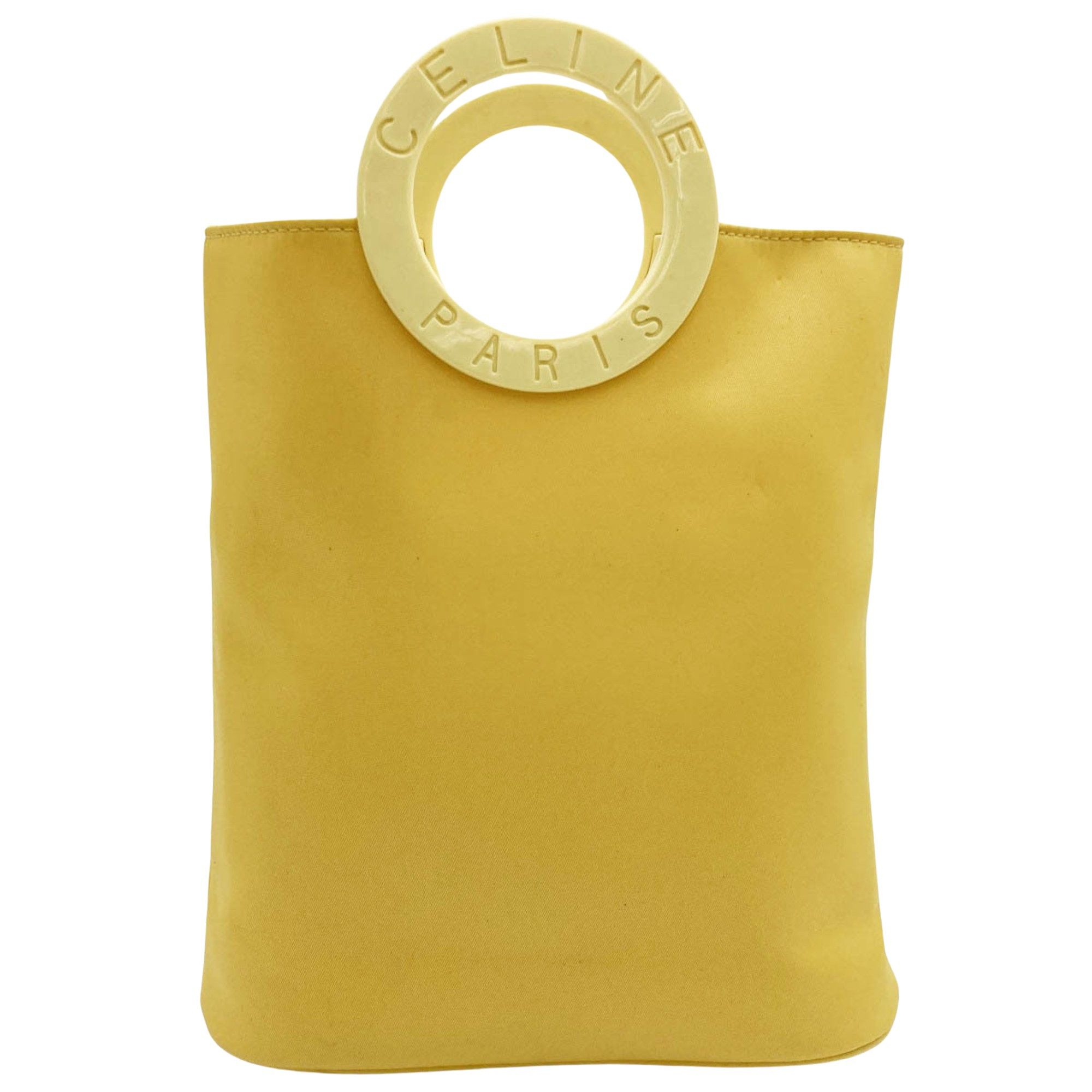 image of Celine Céline Handbag in Yellow, Women's