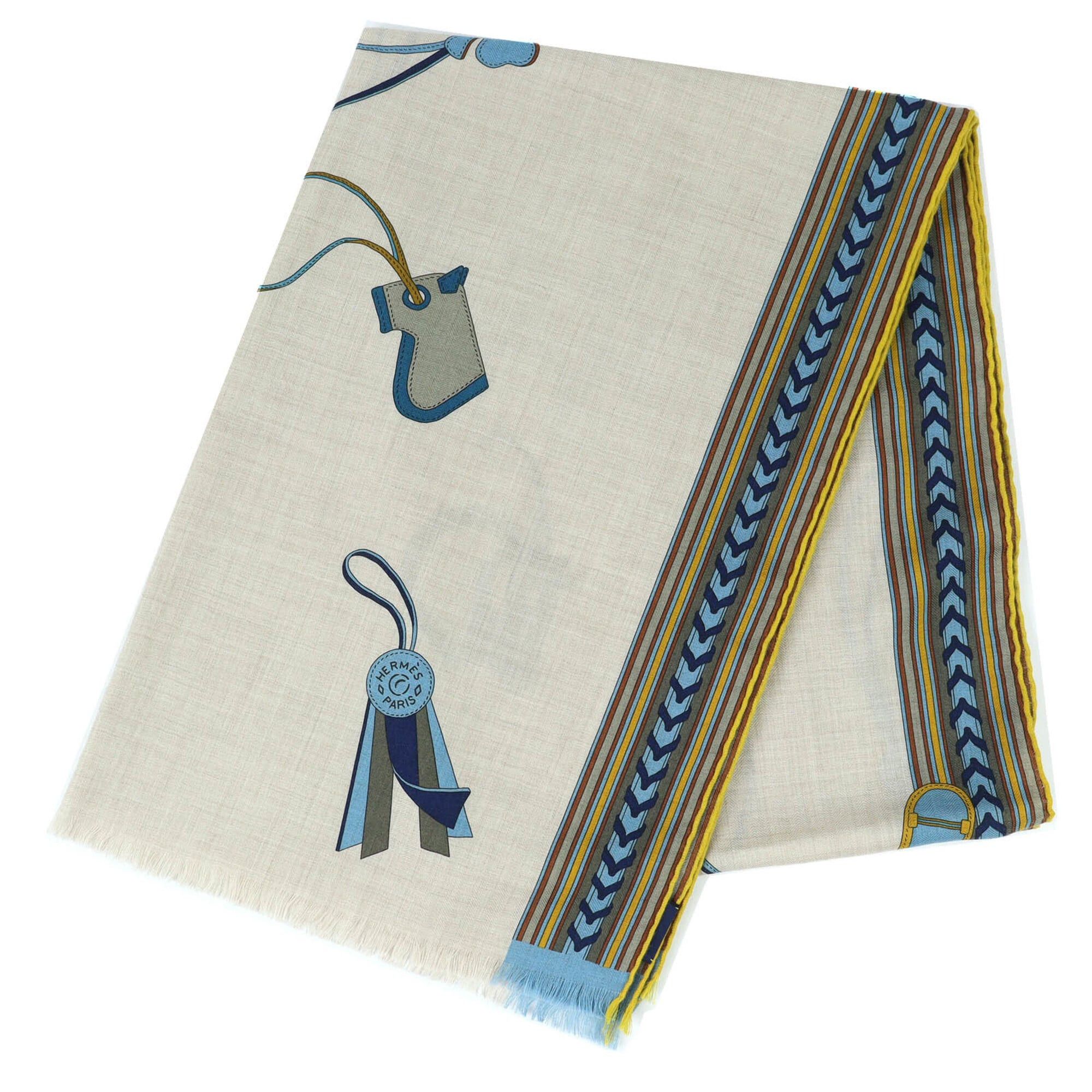 Hermes HERMES Rectangle BRIDES ET GRIS (Bridles and Charms) Cashmere Silk Fringe Scarf/Muffler/Stole/Muffler in Beige, Blue, Yellow. Comes with a box. Made France. Recommended for both women men. Size ONE SIZE - 1 Thumbnail